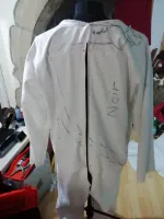 The zipper will be in the back, like a real space suit